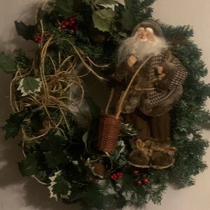Festive Green Holiday Wreath with Santa Figurine